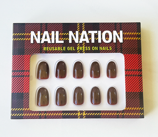 Box of Nail Nation reusable gel press-on nails with tartan design