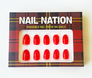 Box of Nail Nation reusable gel press-on nails with tartan design