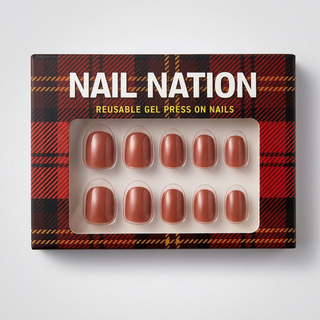 Box of Nail Nation reusable gel press on nails with plaid design