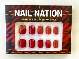 Box of Nail Nation reusable gel press on nails with red nail samples.