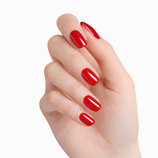 Hand with red nail polish on a white background