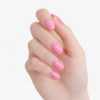 Hand with pink nail polish on a white background
