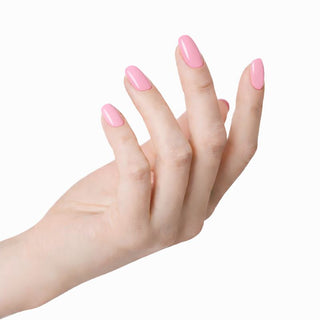 Hand with pink nail polish on a white background