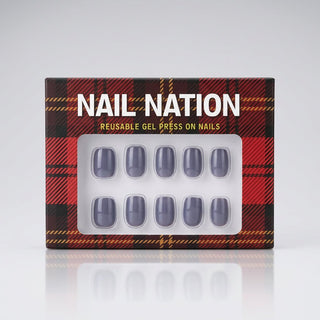 Box of Nail Nation reusable gel press on nails with plaid design
