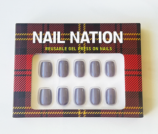 Box of Nail Nation reusable gel press-on nails with tartan design
