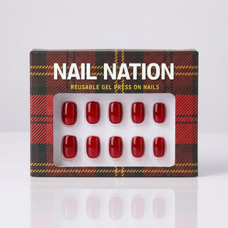 Box of Nail Nation reusable gel press on nails with red nail samples.