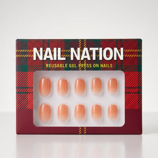 Box of Nail Nation reusable gel press on nails with plaid design